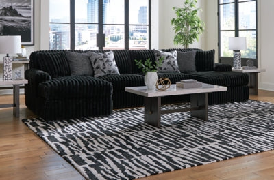 Midnight-Madness Sectional with Chaise - 3 Bros Warehouse